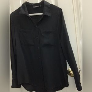 Long sleeve black dress blouse.  Gently used, normal wear.